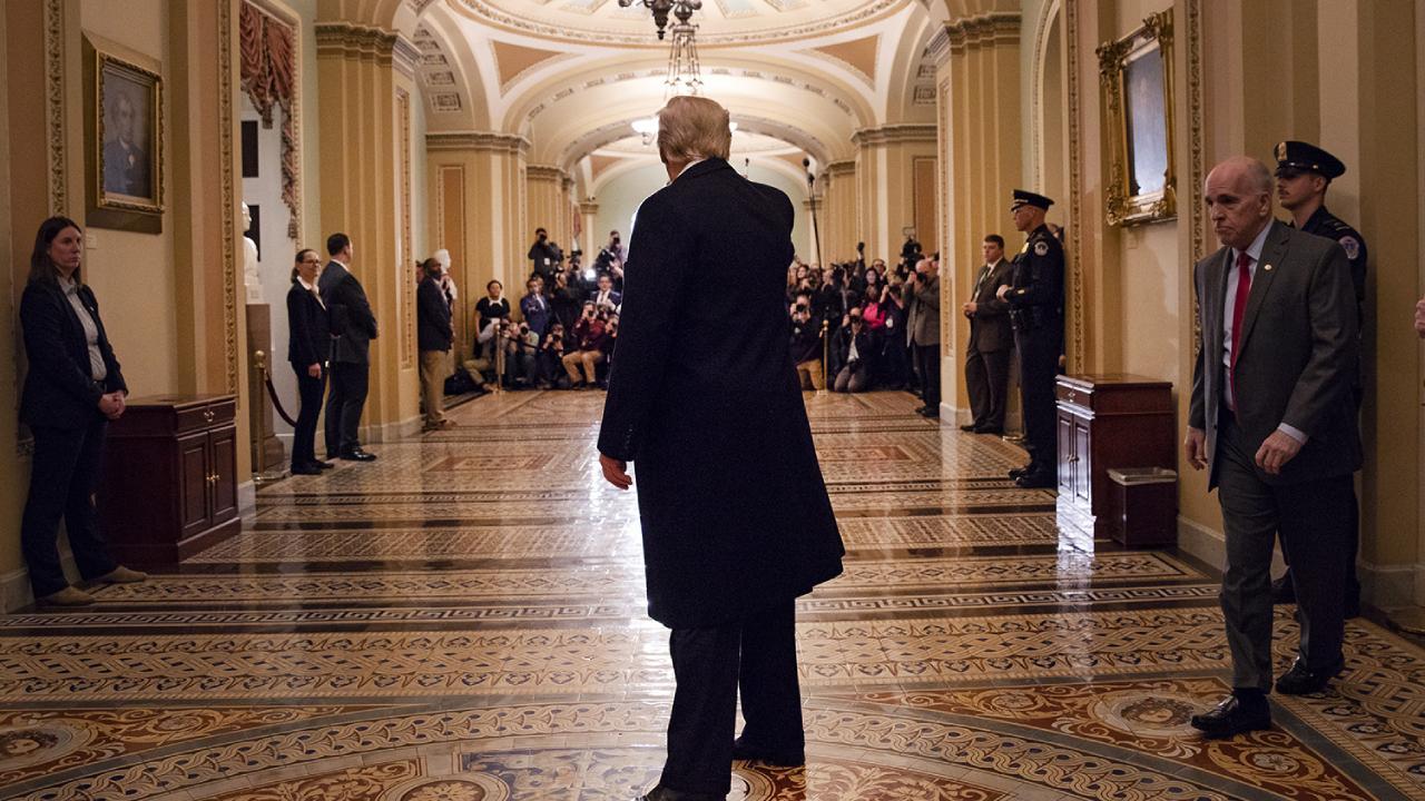 President Donald J. Trump waves to a crowd of reporters after attending a Senate Republican luncheon Tuesday, March 26, 2019, as he leaves the U.S. Capitol in Washington, D.C. (Official White House Photo by Joyce N. Boghosian)