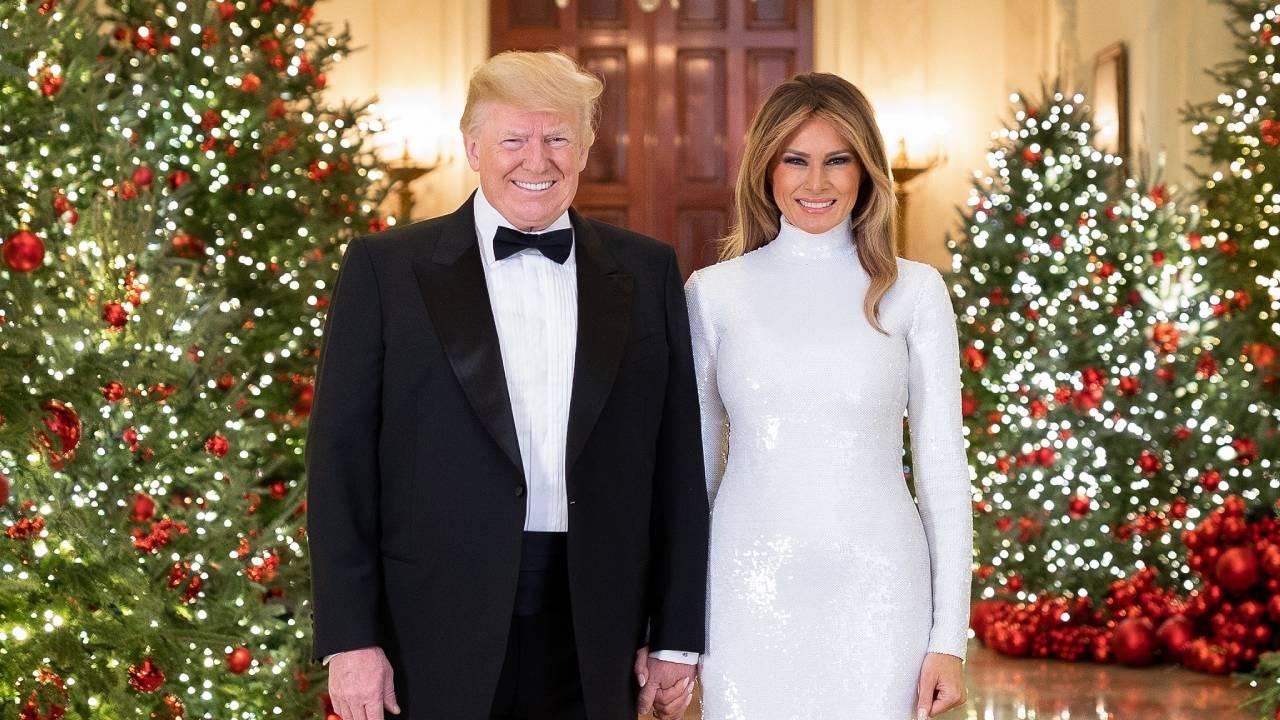 President Donald J. Trump and First Lady Melania Trump are seen in their Official Christmas Portrait on Saturday, December 15, 2018, in the Cross Hall of the White House. (Official White House Photo by Andrea Hanks)