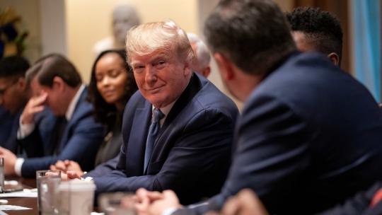 President Donald J. Trump listens as Senator Ted Cruz delivers remarks at a roundtable on empowering families with education choice Monday, Dec. 9, 2019, in the Cabinet Room of the White House. (Official White House Photo by Tia Dufour)